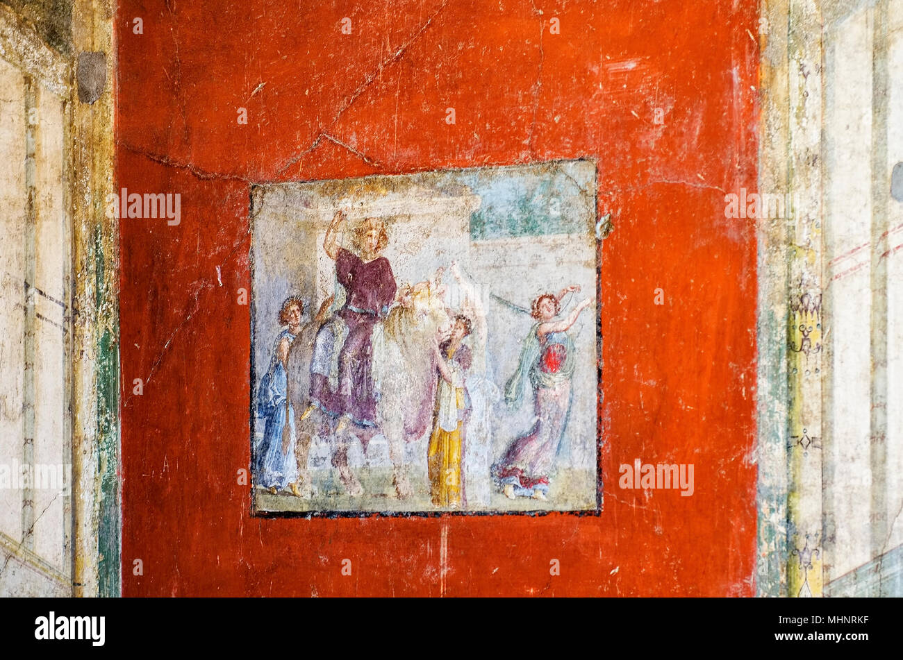 The fresco in ancient Pompeii depicts the rapture of Europe by Zeus under the guise of a bull. Stock Photo