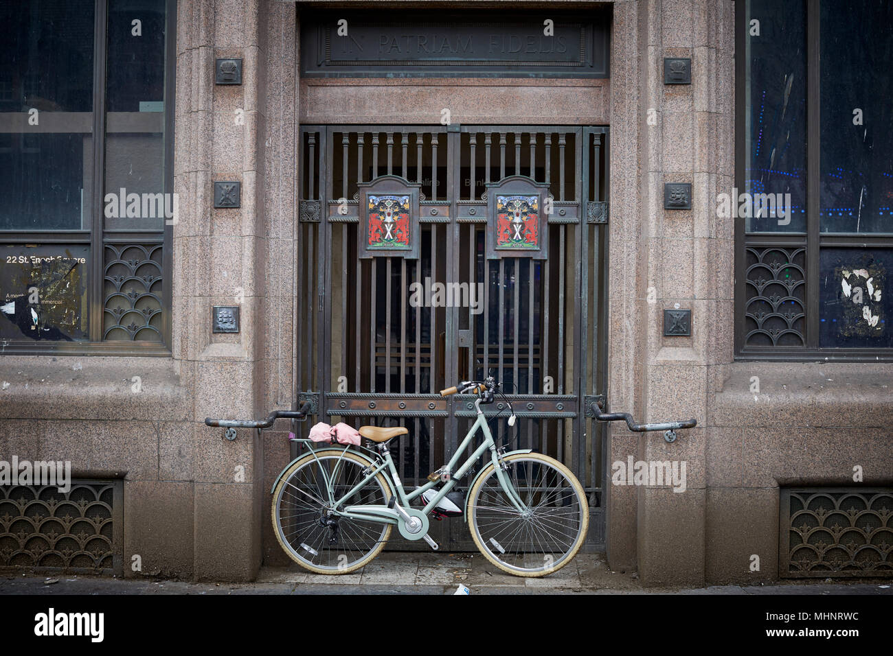 Glasgow in Scotland,   bike locked to old bank on Buchanan Street Stock Photo