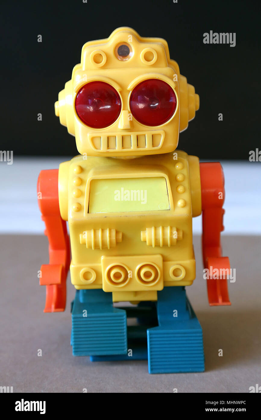 Retro Toy Walking Plastic Robot - Yellow Body (2/3) Stock Photo
