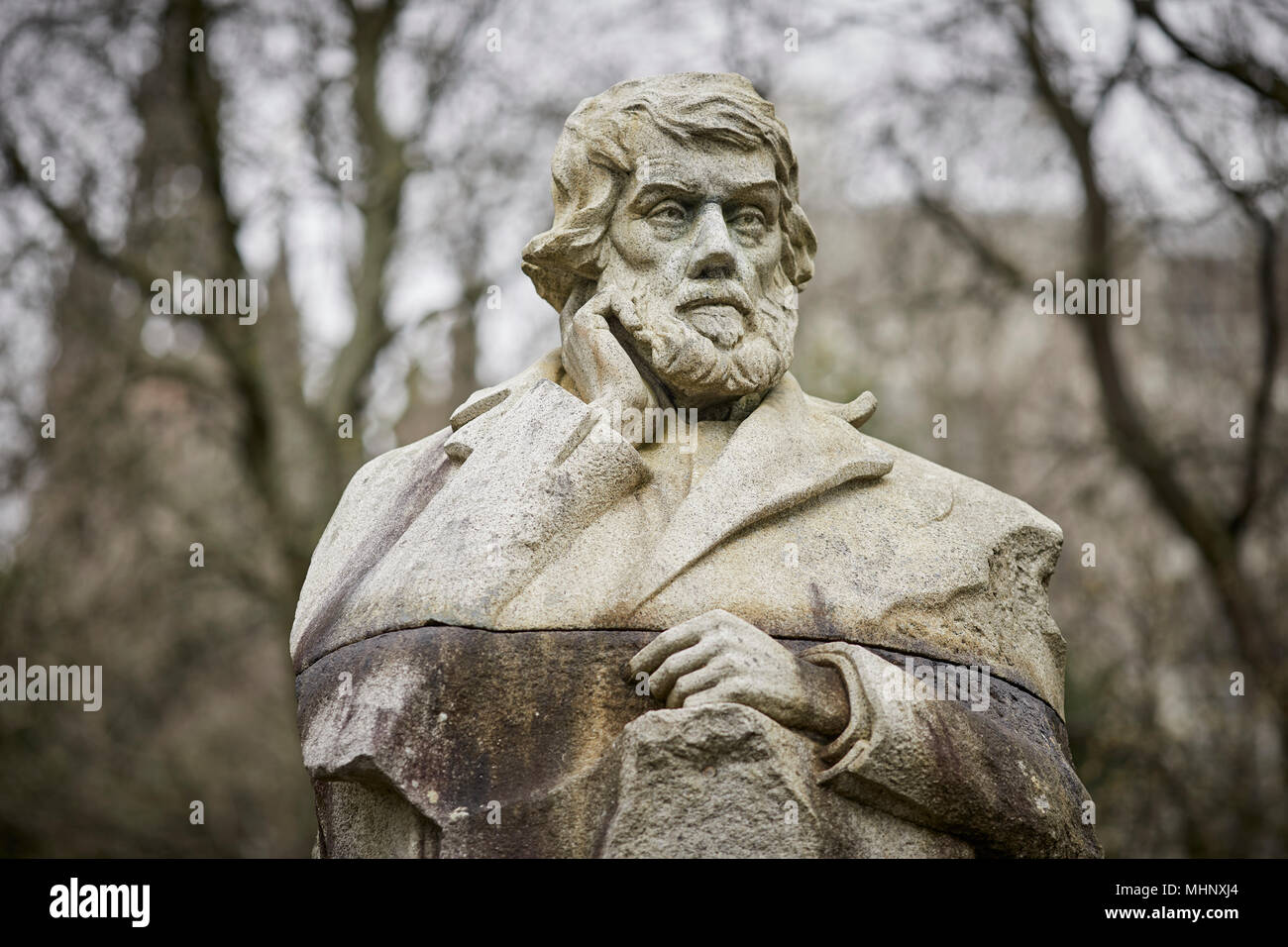 Glasgow in Scotland,  Statue of Thomas Carlyle a Scottish philosopher, writer, essayist, historian and teacher Kelvingrove Park, Stock Photo