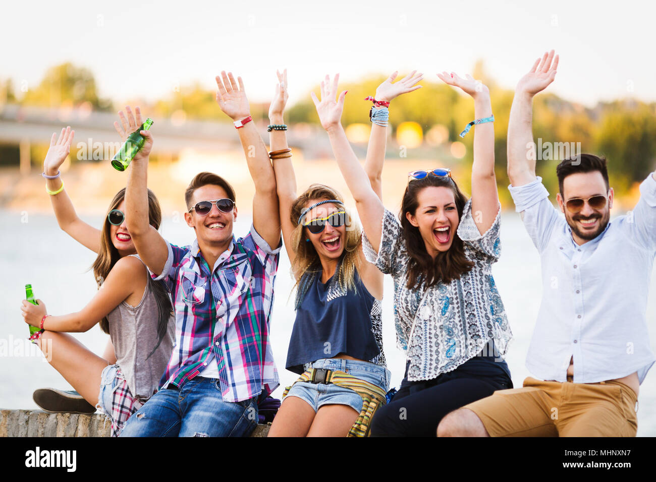 Group of young happy friends having fun time Stock Photo