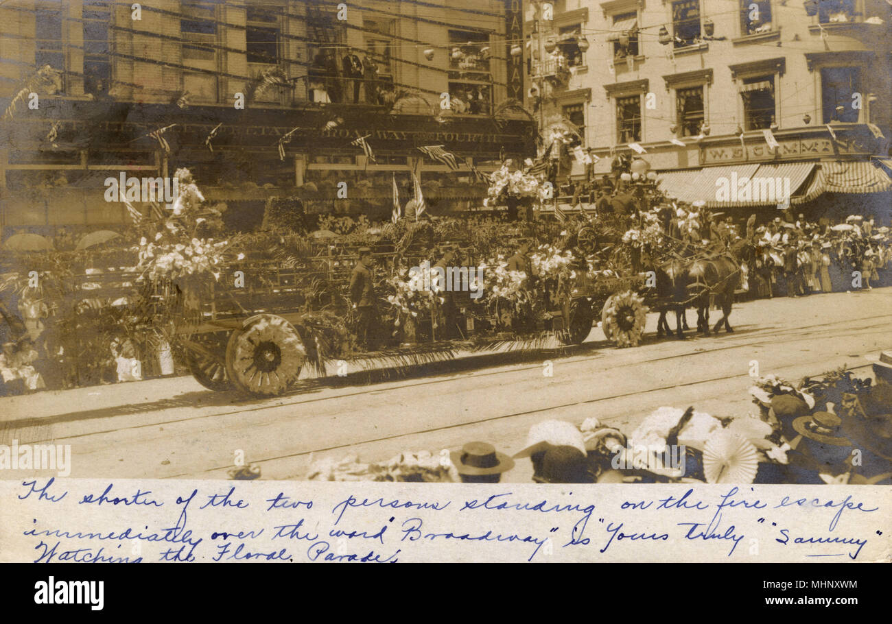 Floral parade at Fourth and Broadway, Los Angeles, California, USA. Showing a horse-drawn float.      Date: 1900s Stock Photo