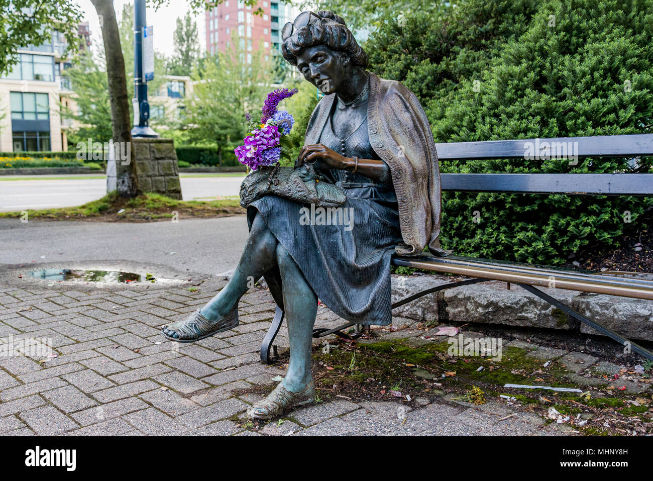 Sculpture of woman on bench with purse, Vancouver, British Columbia