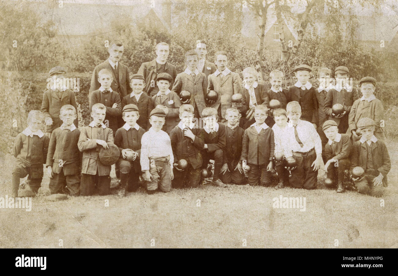Group photo, boys and men at a bowling club.      Date: circa 1908 Stock Photo