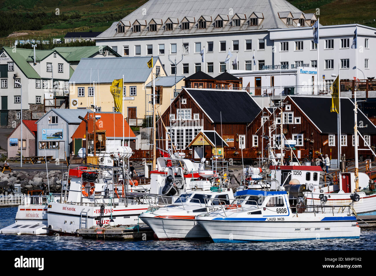 Boats and colorful buildings, Husavik Harbor, Husavik, Iceland Stock Photo