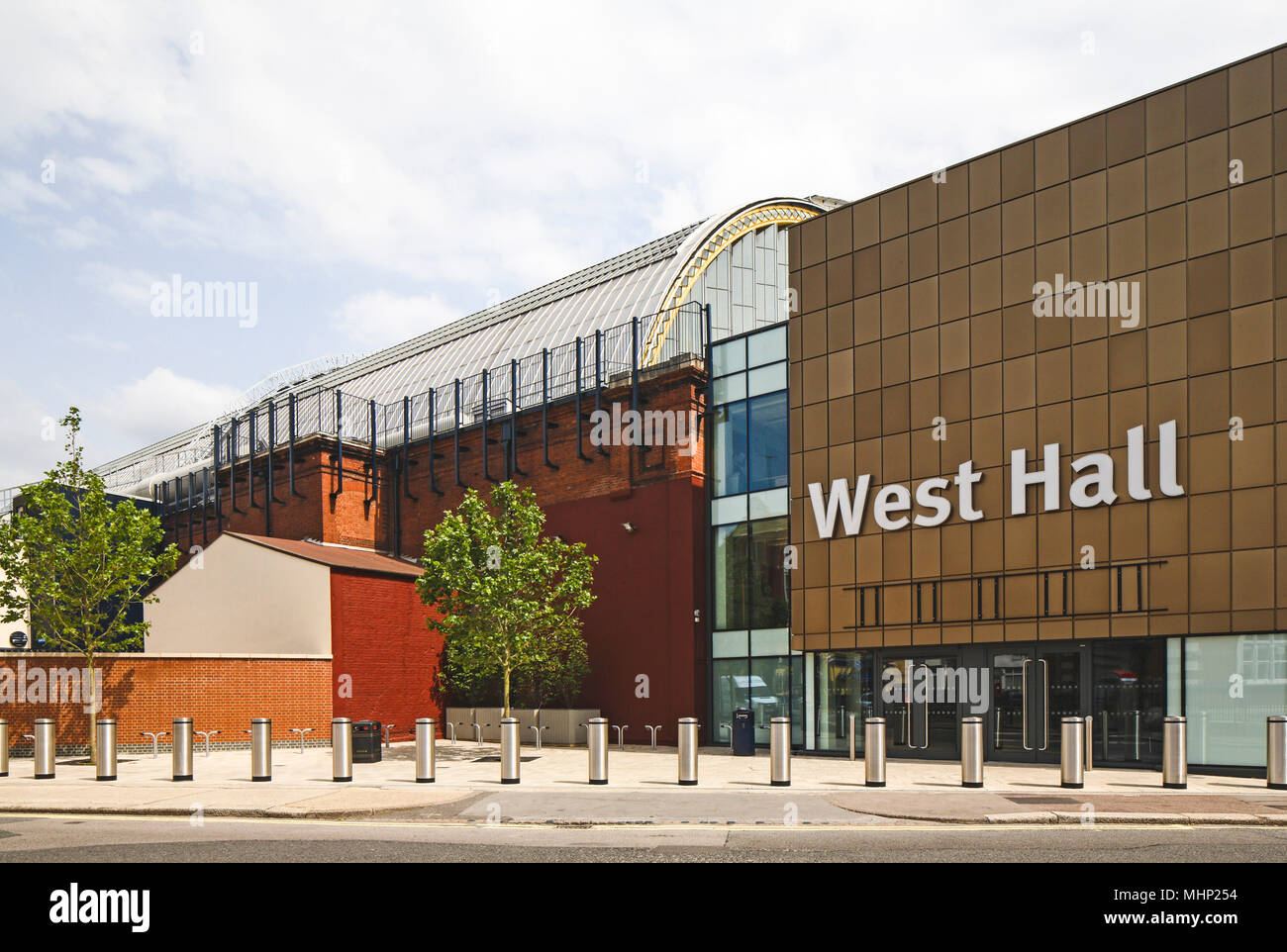 Oblique view of the new West Hall merged with the original iconic exhibition centre. Olympia London, London, United Kingdom. Architect: Collado Collin Stock Photo