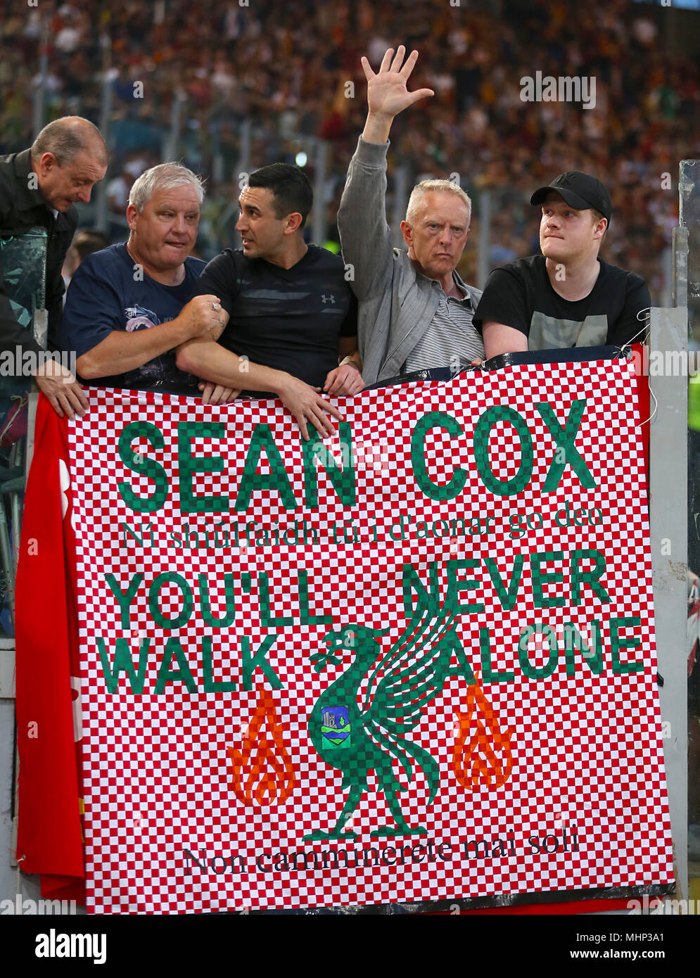 Liverpool fans holding a sign for Sean Cox, a Liverpool fan who was attacked  outside Anfield during the UEFA Champions League, Semi Final, Second Leg at  the Stadio Olimpico, Rome Stock Photo -