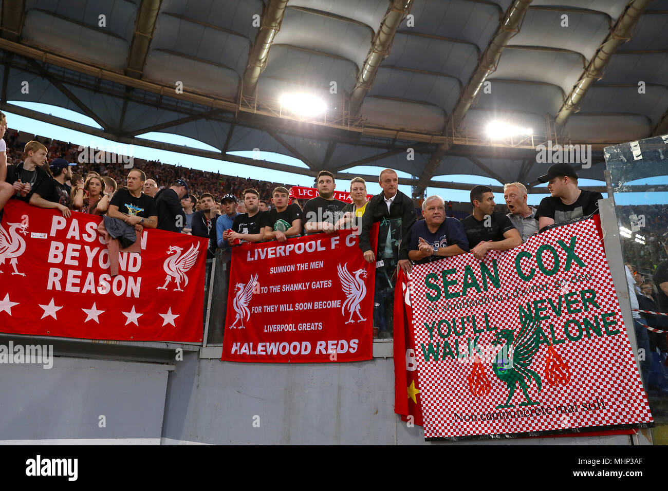 Liverpool fans holding a sign for Sean Cox, a Liverpool fan who was attacked outside Anfield during the Champions League, Semi Final, at the Stadio Olimpico, Rome Stock -