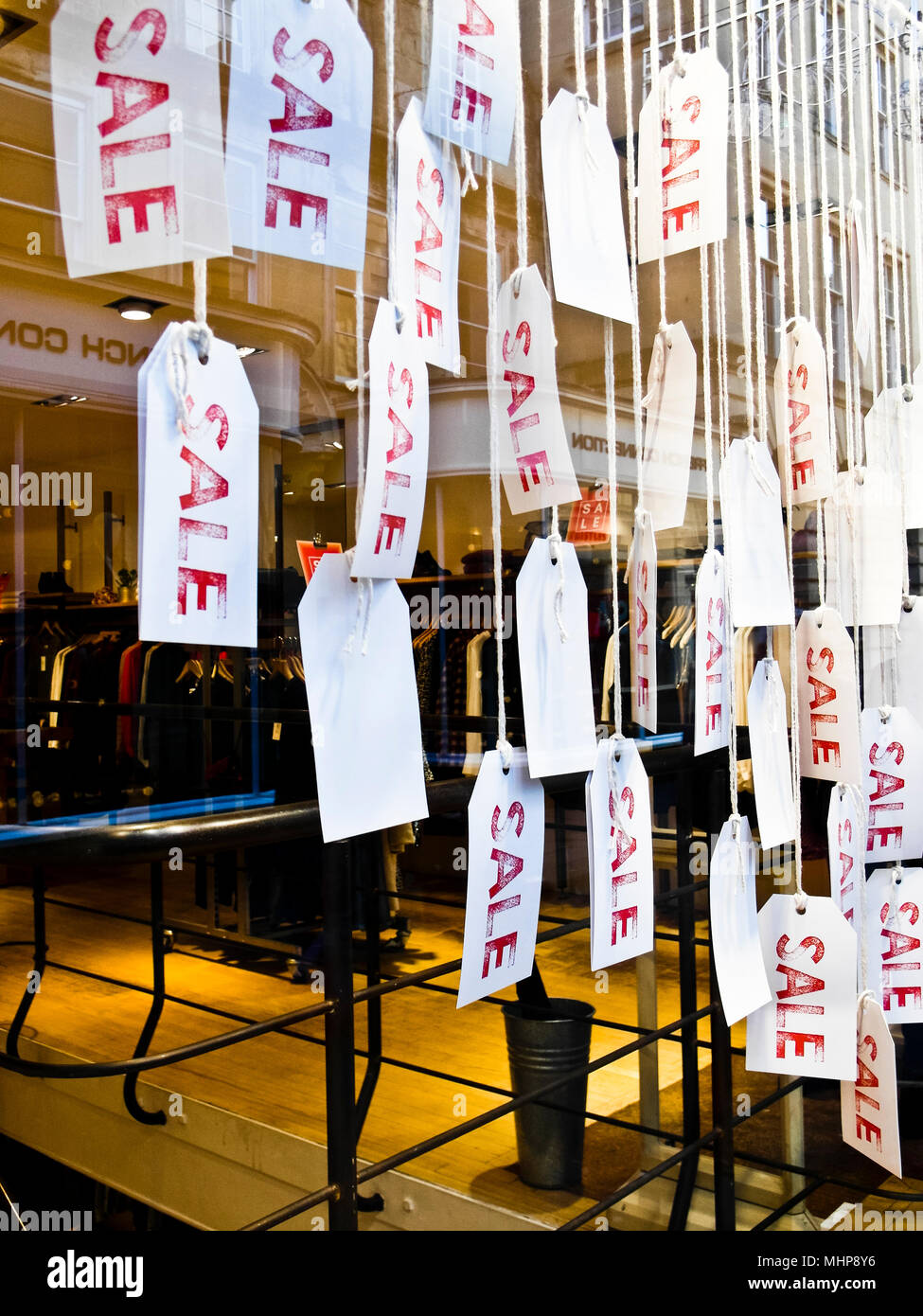 Price tags display sale in shop window Stock Photo - Alamy