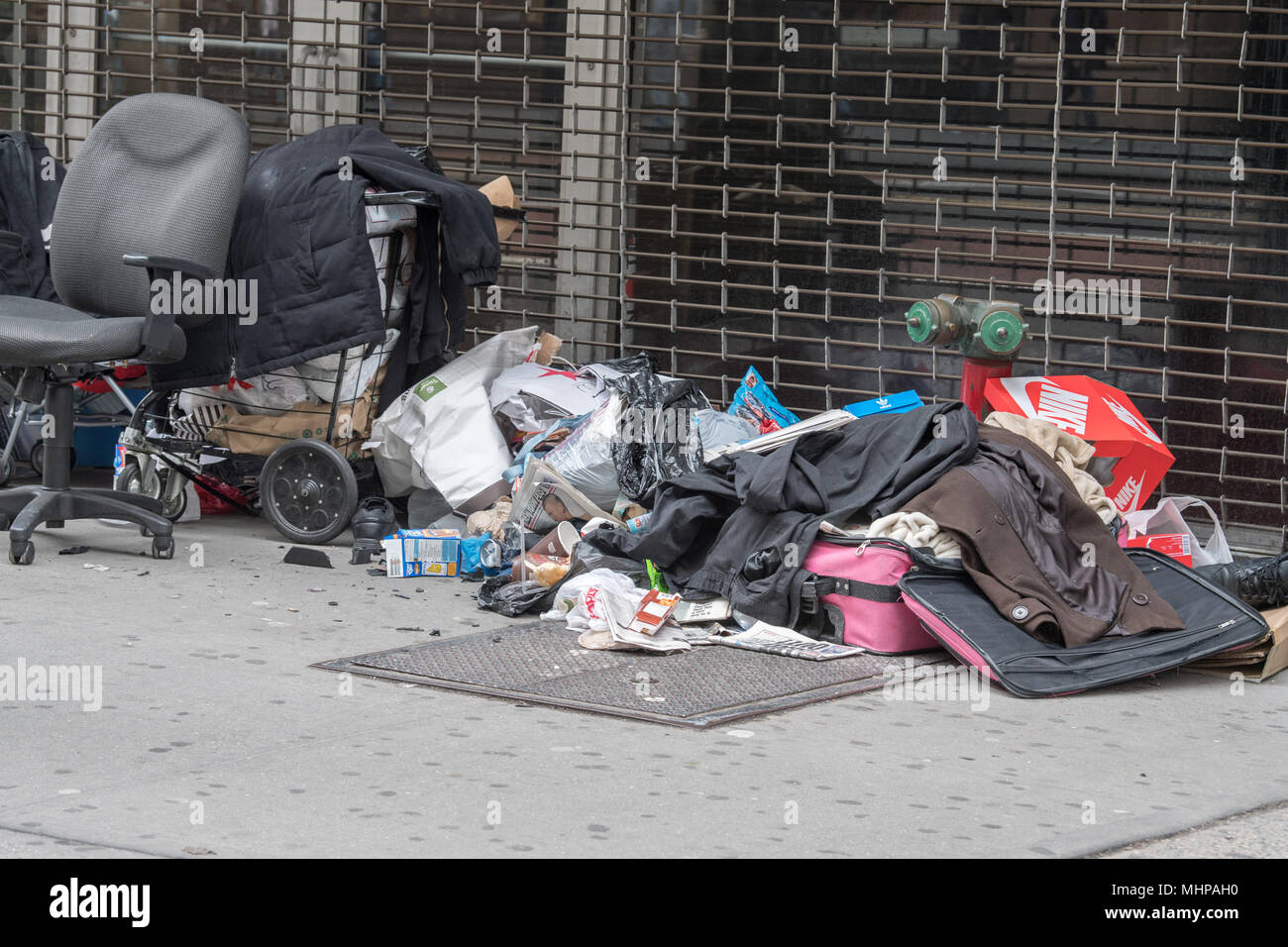 NEW YORK, USA APRIL 21 2017 poor homeless in city street with his