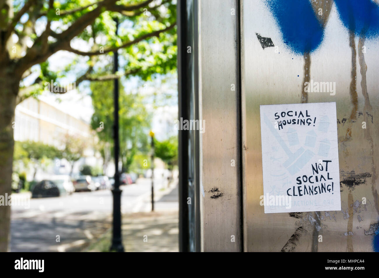 Social Housing! Not Social Cleansing! slogan on a sticker in Lambeth, South London. Stock Photo