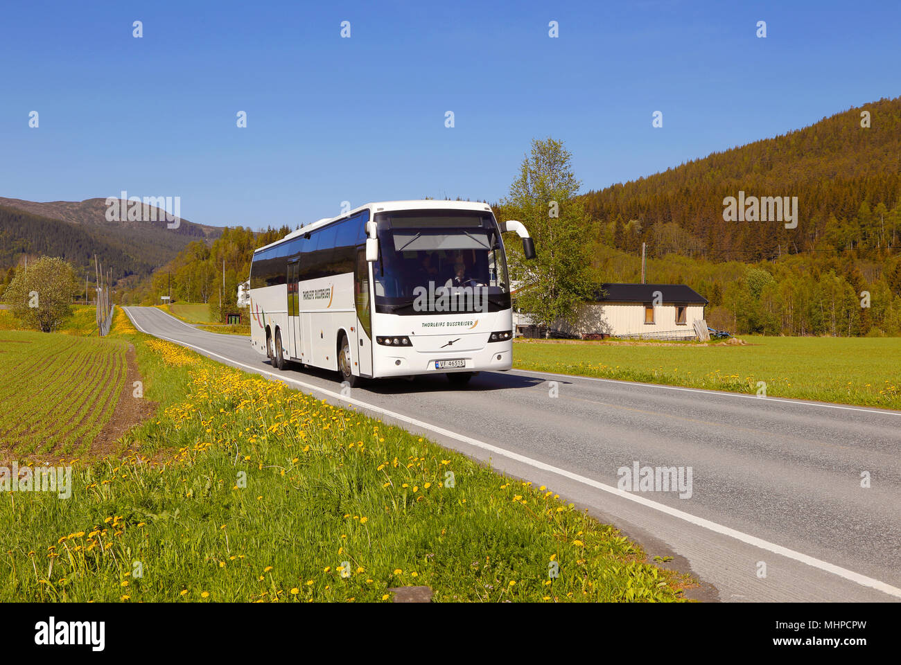 Meraker Norway A Coach From Thorleifs Bussreiser Traveling In Summer Countryside To The East On The Road E14 Just West Of Meraker Stock Photo Alamy