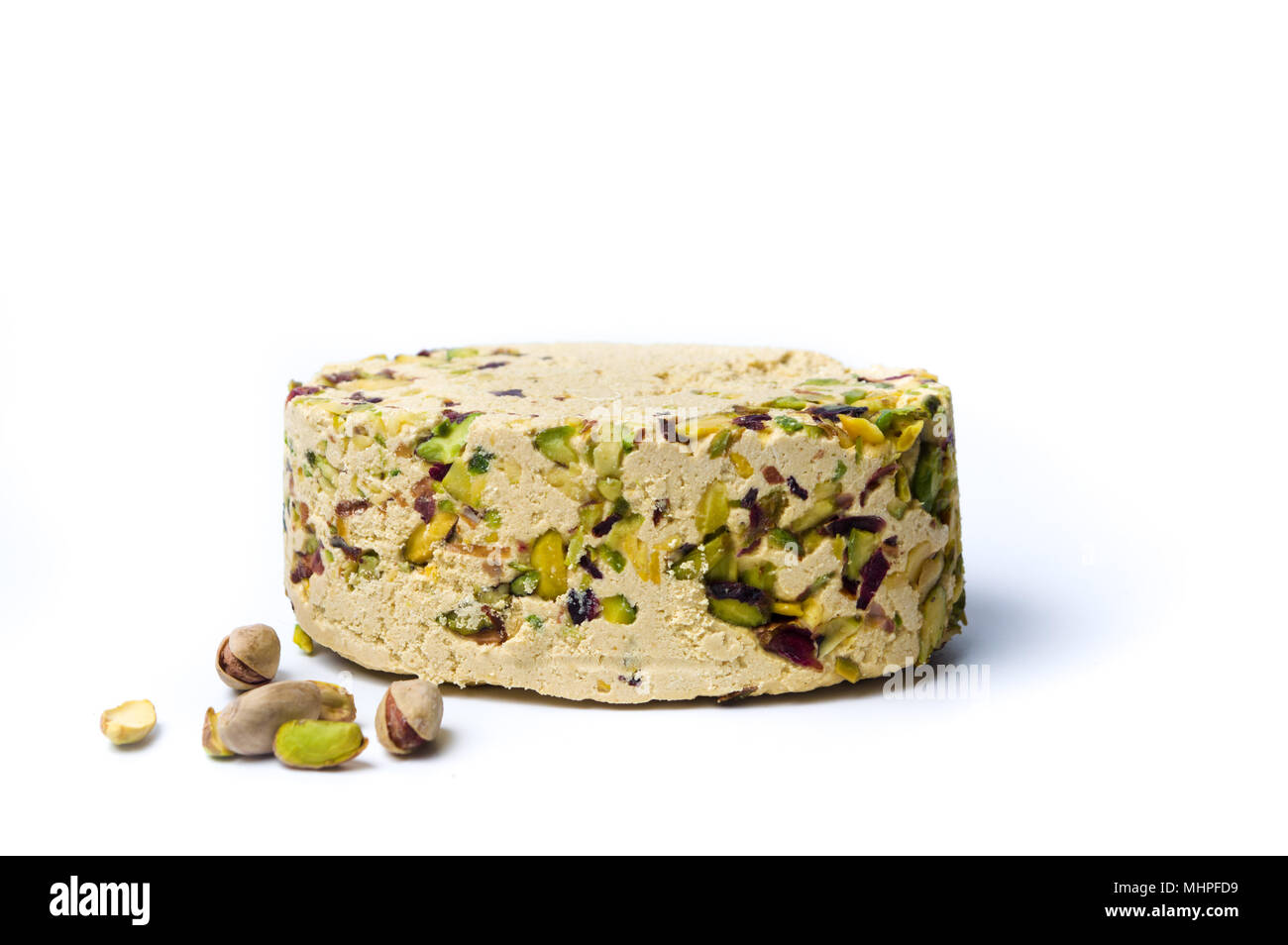 Halva with pistachio isolated on white background Stock Photo Alamy