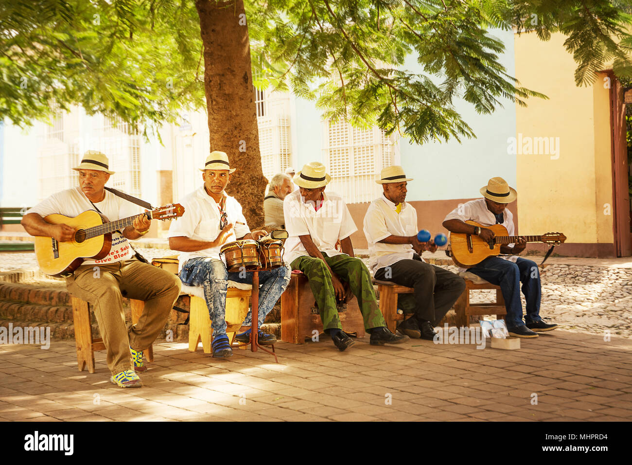 Trinidad, Cuba - 8 december 2017: Musical group that plays Cuban music in the square Stock Photo