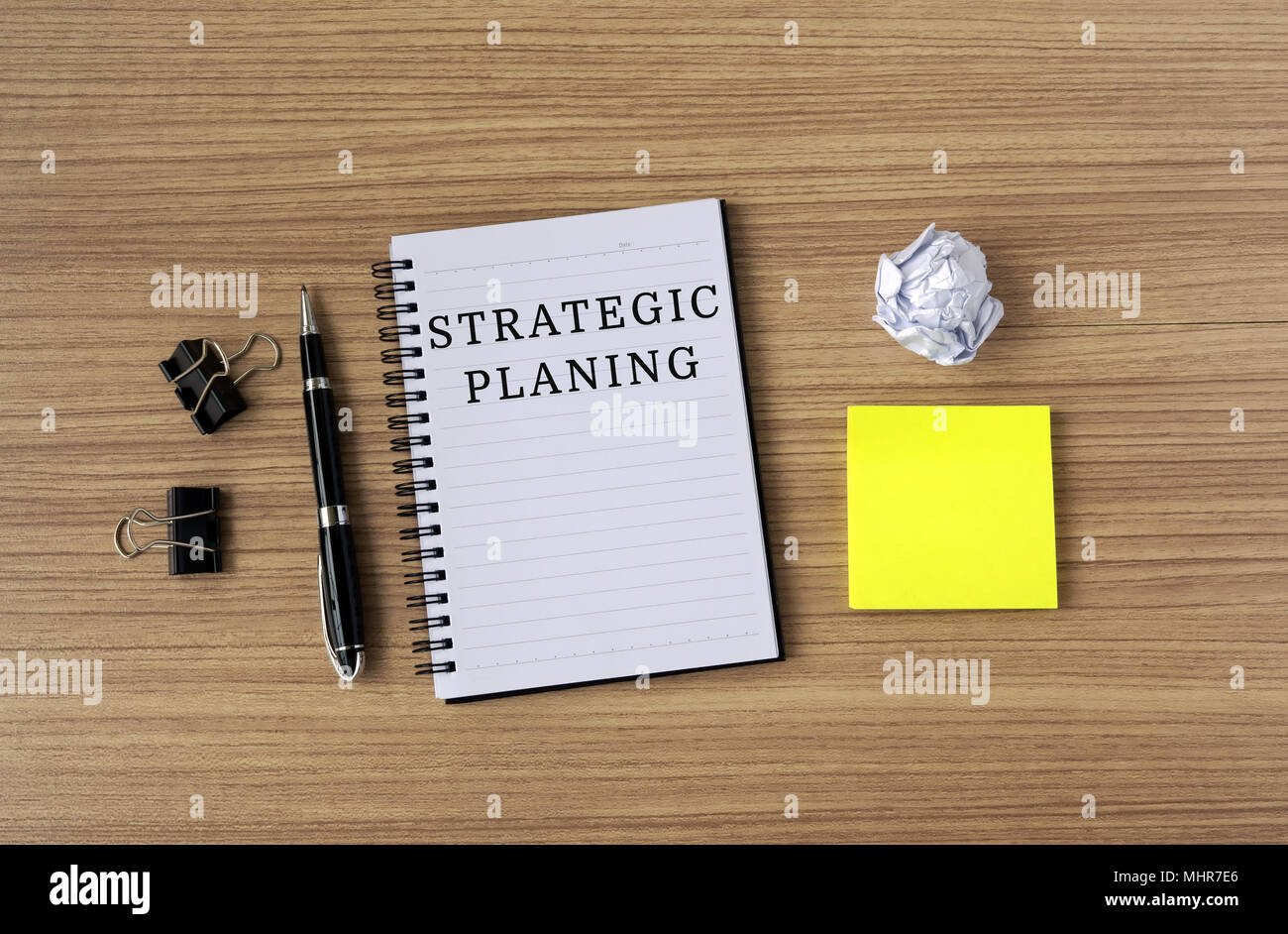 Strategic Planning text on notepad, flat lay office desk. Stock Photo
