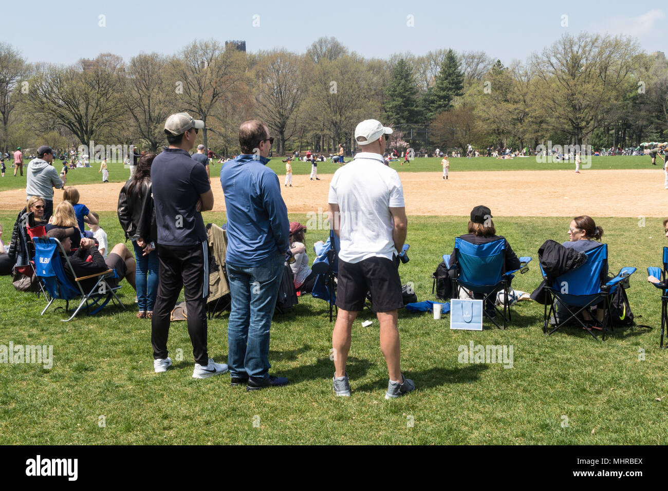Spectators at the Softball Fields in Central Park, NYC, USA Stock Photo