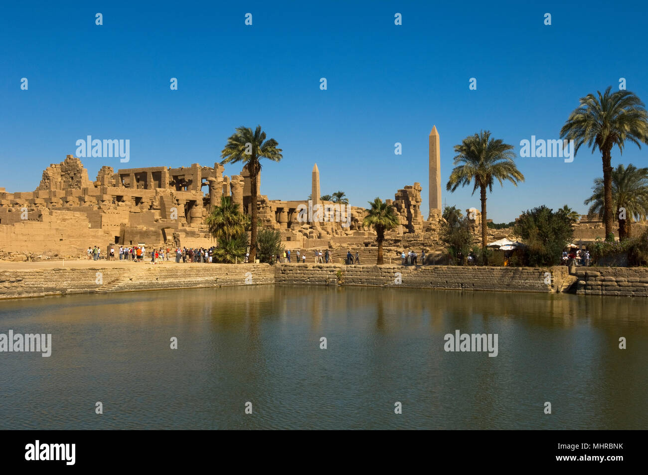 View across the Sacred Lake, Karnak Temple Complex, UNESCO World Heritage Site, Luxor, Egypt Stock Photo