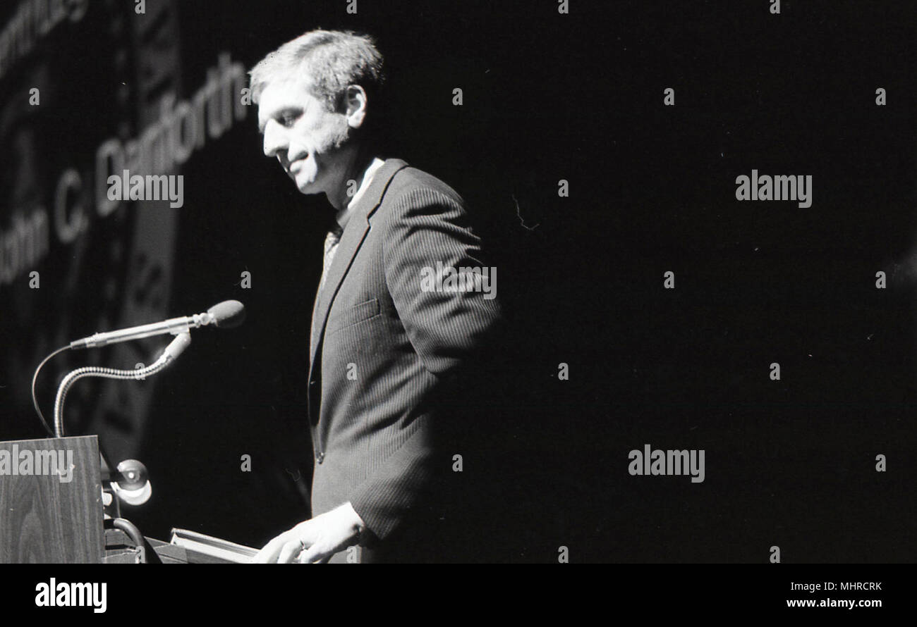 Black and white photo of a man speaking from a podium Stock Photo - Alamy