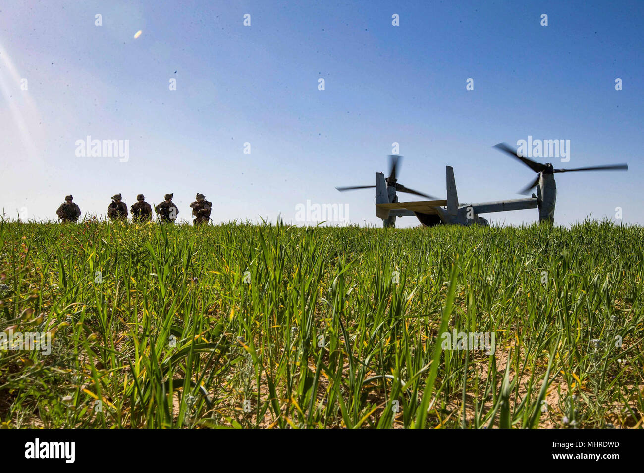 HAIFA, Israel (March 14, 2018) U.S. Marines assigned to the Tactical Recovery of Aircraft Personnel (TRAP) team, 26th Marine Expeditionary Unit (MEU), arrive in a landing zone of an MV-22B Osprey aircraft to conduct a simulated search mission, in Haifa, Israel, March 14, 2018. Juniper Cobra is a computer assisted exercise conducted through computer simulations focused on improving combined missile defense capabilities and overall interoperability between the U.S. European Command and Israel Defense Force. (U.S. Marine Corps Stock Photo
