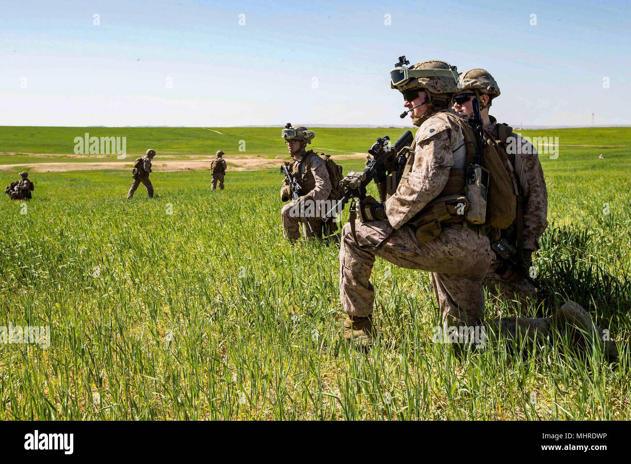 HAIFA, Israel (March 14, 2018) U.S. Marines assigned to the Tactical Recovery of Aircraft Personnel (TRAP) team, 26th Marine Expeditionary Unit (MEU), pause to relay information during a simulated search mission, in Haifa, Israel, March 14, 2018. Juniper Cobra is a computer assisted exercise conducted through computer simulations focused on improving combined missile defense capabilities and overall interoperability between the U.S. European Command and Israel Defense Force. (U.S. Marine Corps Stock Photo