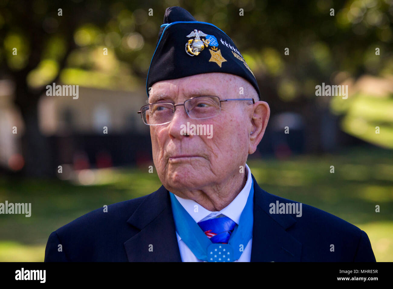 U.S. Marine Corps Chief Warrant Officer 4 Hershel 'Woody' Williams (Ret.) reflects on what took place on Iwo Jima at the National Memorial Cemetary of the Pacific, Honolulu HI, March 17, 2018. Williams traveled to Oahu to participate in various events and visit the graves of World War II veterans that made the ultimate sacrifice. (U.S. Marine Corps Stock Photo
