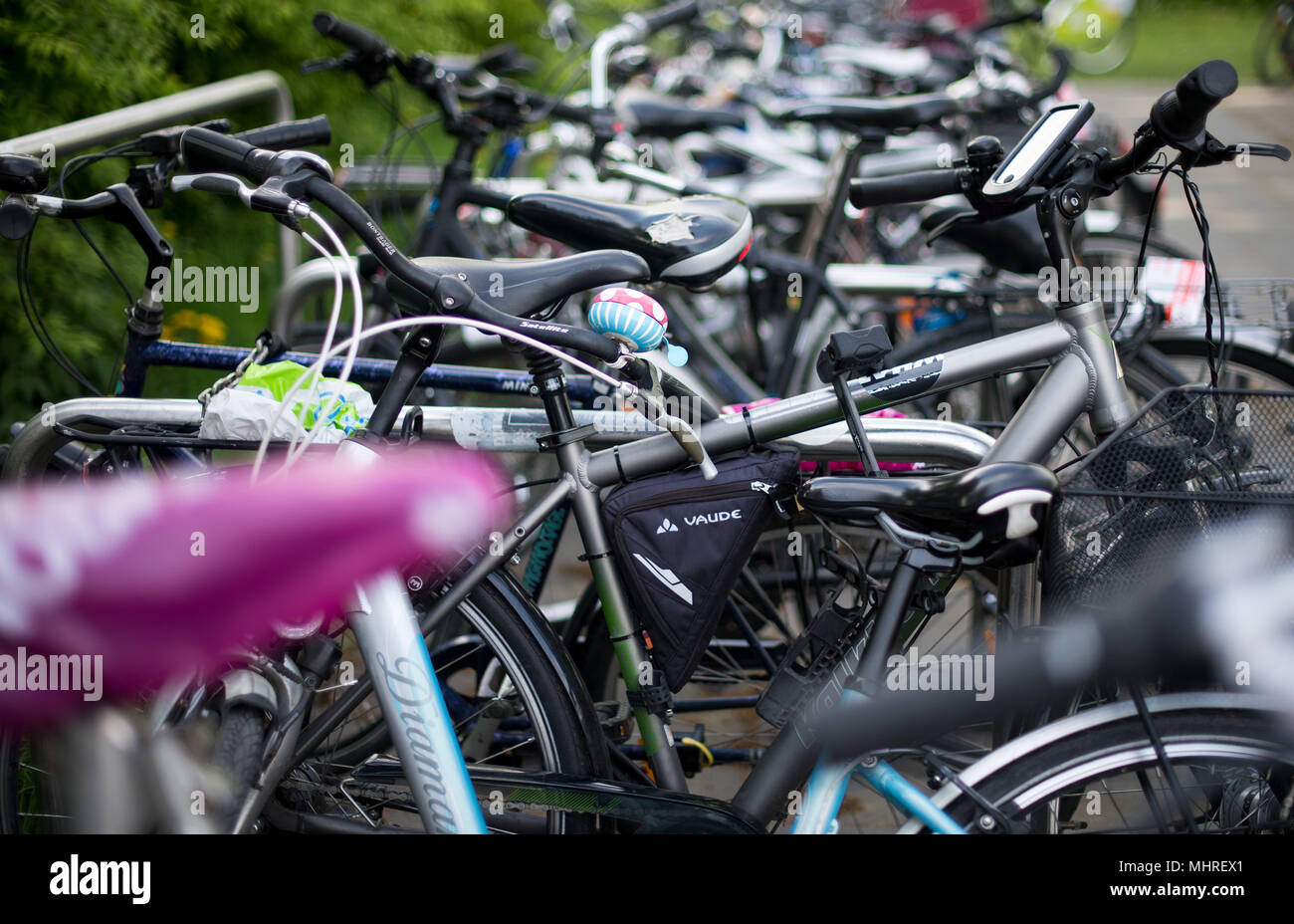 02 May 2018, Germany, Dresden: Numerous bikes parked at bycicles stands. The General German Bike Club (ADFC) has complained of the lack of decent bycicles stands in Saxony. Photo: Monika Skolimowska/dpa-Zentralbild/dpa Stock Photo