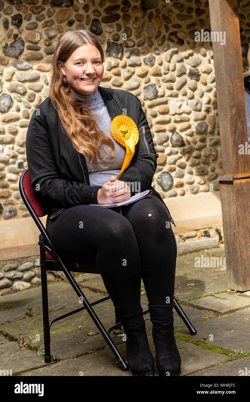 Brentwood Essex, 3rd May 2018, a Liveral Democrat polling agent outside the Polling station at St Peter's Church South Weald, Brentwood, Essex, Polling agents endeavour to note which voters have voted so they can call on voters who are likely to support their party and have not voted.  This is for the local elections in England Credit Ian Davidson/Alamy Live News Stock Photo