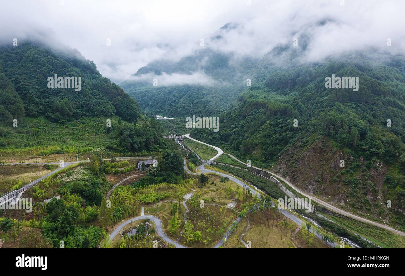 Chengdu. 18th Aug, 2017. This aerial photo taken on August 18, 2017 shows forests in Wolong National Nature Reserve in southwest China's Sichuan Province. In recent years, authorities in Sichuan have carried out a series of ecological projects to protect eco-systems in the upper reaches of the Yangtze River. Credit: Xue Yubin/Xinhua/Alamy Live News Stock Photo