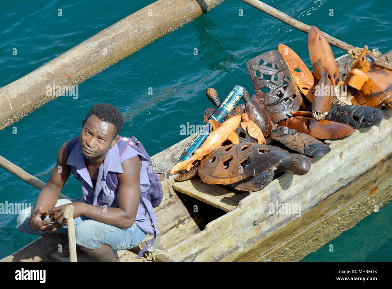 18 January 2018, Madagascar, Andoany: Traders in traditional boats offering fruit and souvenirs to boats lying at anchor off Andoany, capital of the island of Nosy Be off the north-west coast of Madagascar.   | usage worldwide Stock Photo