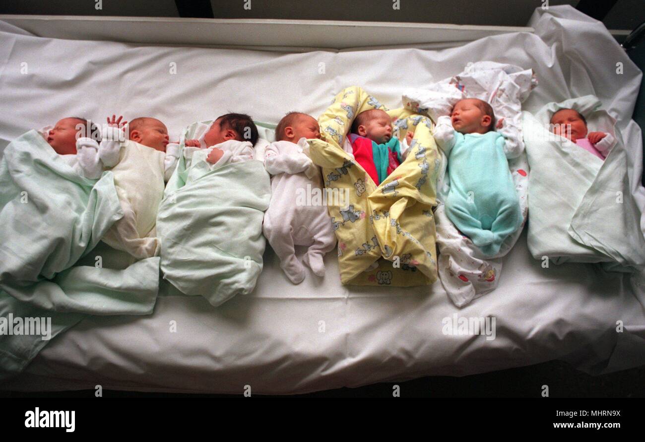 On the 25th of June, 1996, these seven infants take the coming seven-sleep day quite literally on the children's ward Florence Nightingale in Dusseldorf-Kaiserswerth. After an old farmer's rule, the fate of the summer in Germany will be decided on the Seven-Dorm (27th June). According to popular wisdom, the weather has remained unchanged for seven weeks: 'It rains on the Seven-Sister Day, the rain may not give way for seven weeks'. | usage worldwide Stock Photo