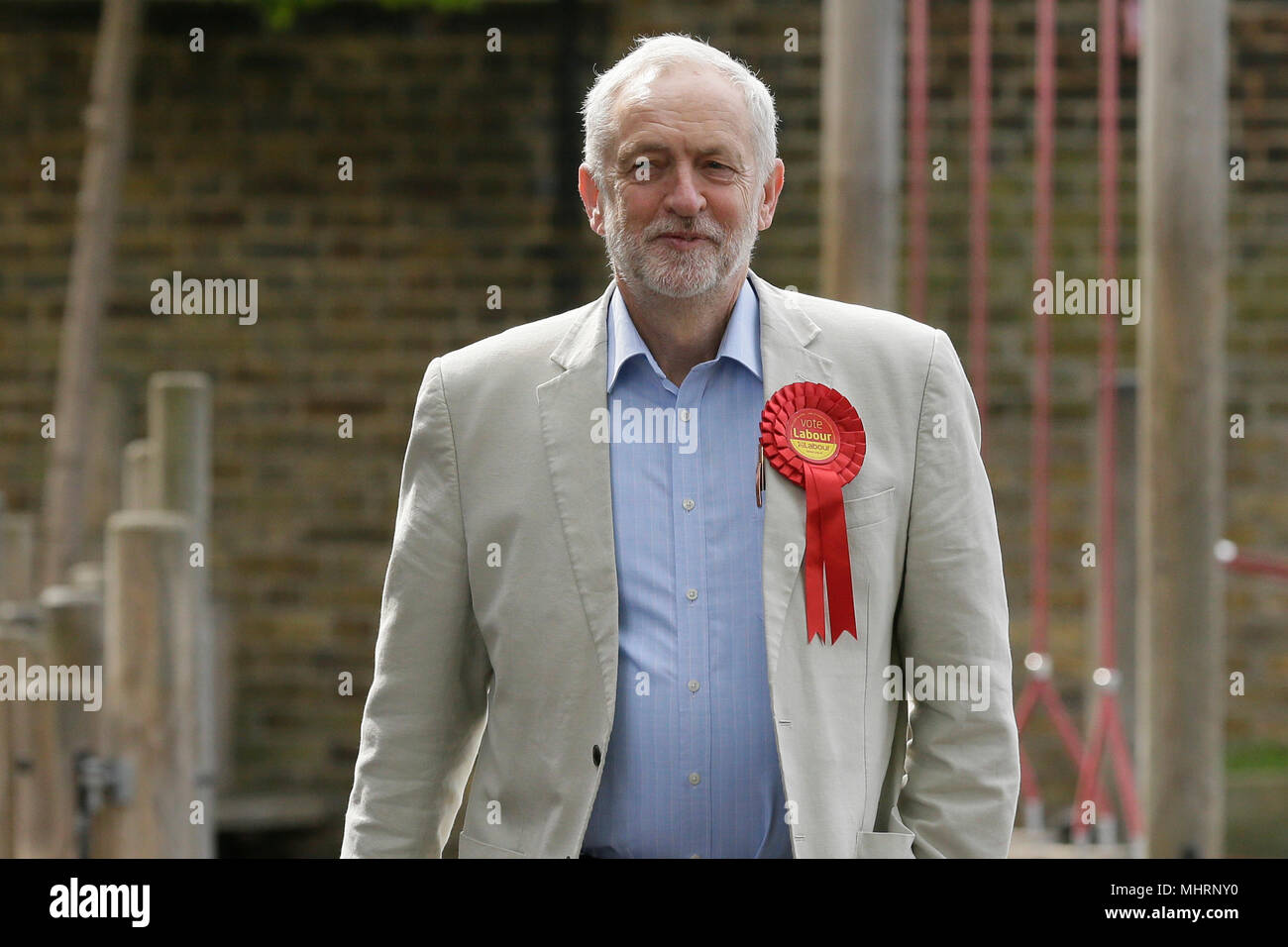 London, UK. 3rd May, 2018. British Labour Party leader Jeremy Corbyn arrives at a polling station to vote in the local council elections in London, Britain on May 3, 2018. Millions of people in towns and cities across England were voting Thursday in what is seen as a litmus test of the big political parties. Credit: Tim Ireland/Xinhua/Alamy Live News Stock Photo