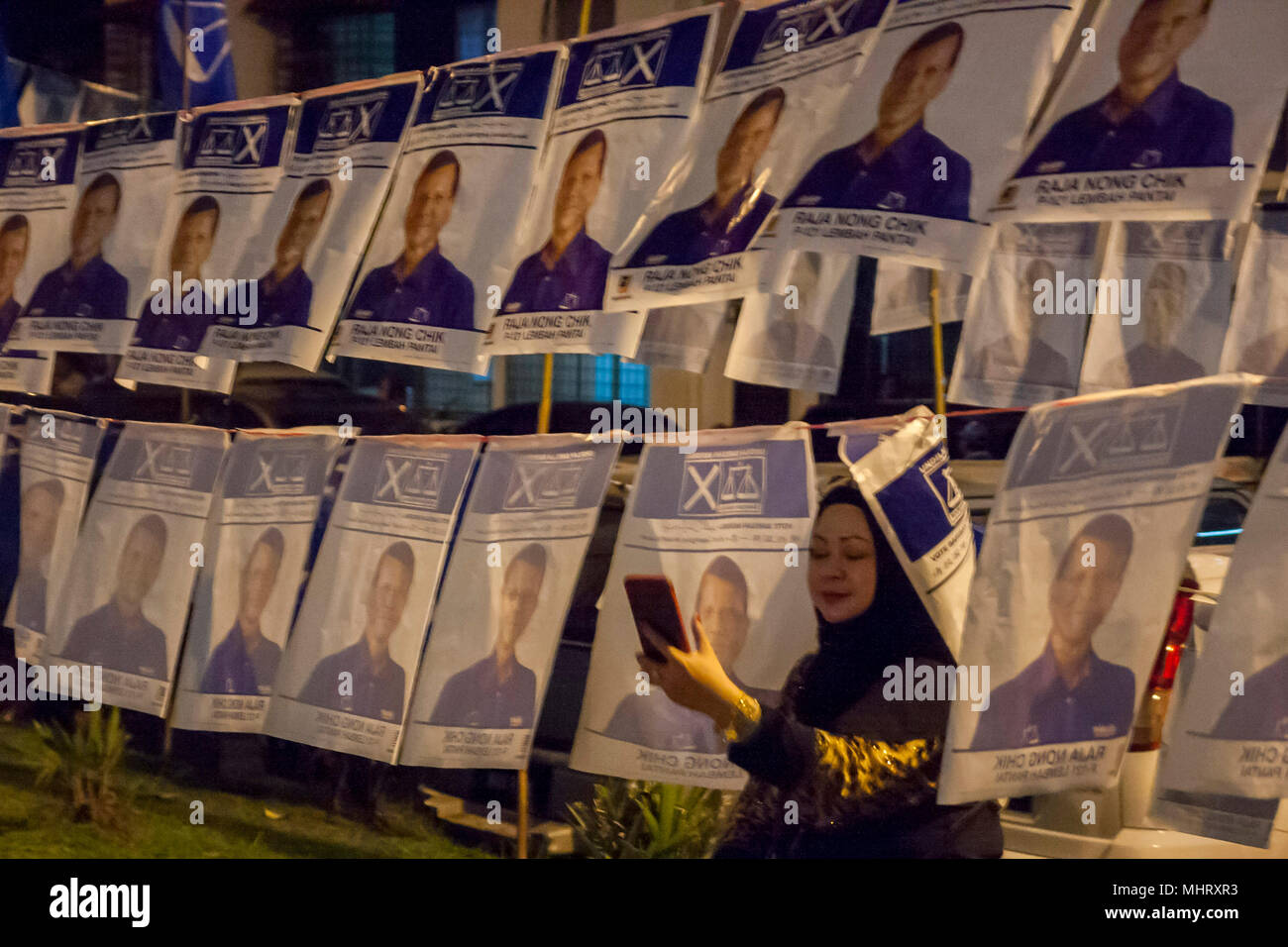 A Women Seen Taking Selfie With A Barisan Nasional Political Poster At A Pakatan Harapan Politic Campaign At Ppr Kerinchi Kuala Lumpur Malaysia Will Hold 14th General Election On 9th May 2018