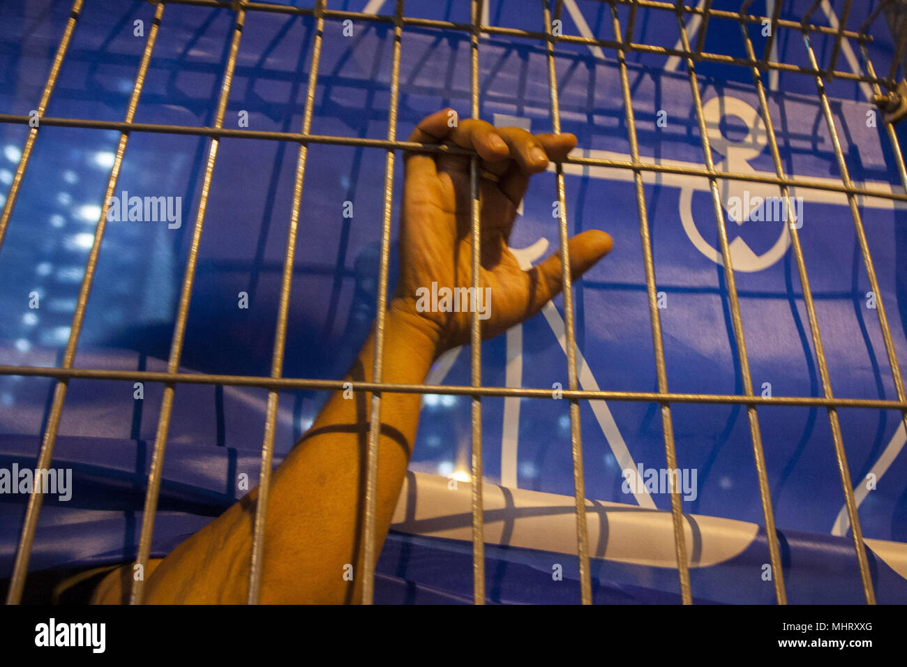 Kuala Lumpur Malaysia 3rd May 2018 A Hand Of An Pakatan Harapan Partisan Seen In Front Of Barisan Nasional Flag Malaysia Will Hold 14th General Election On 9th May 2018 And It S Less