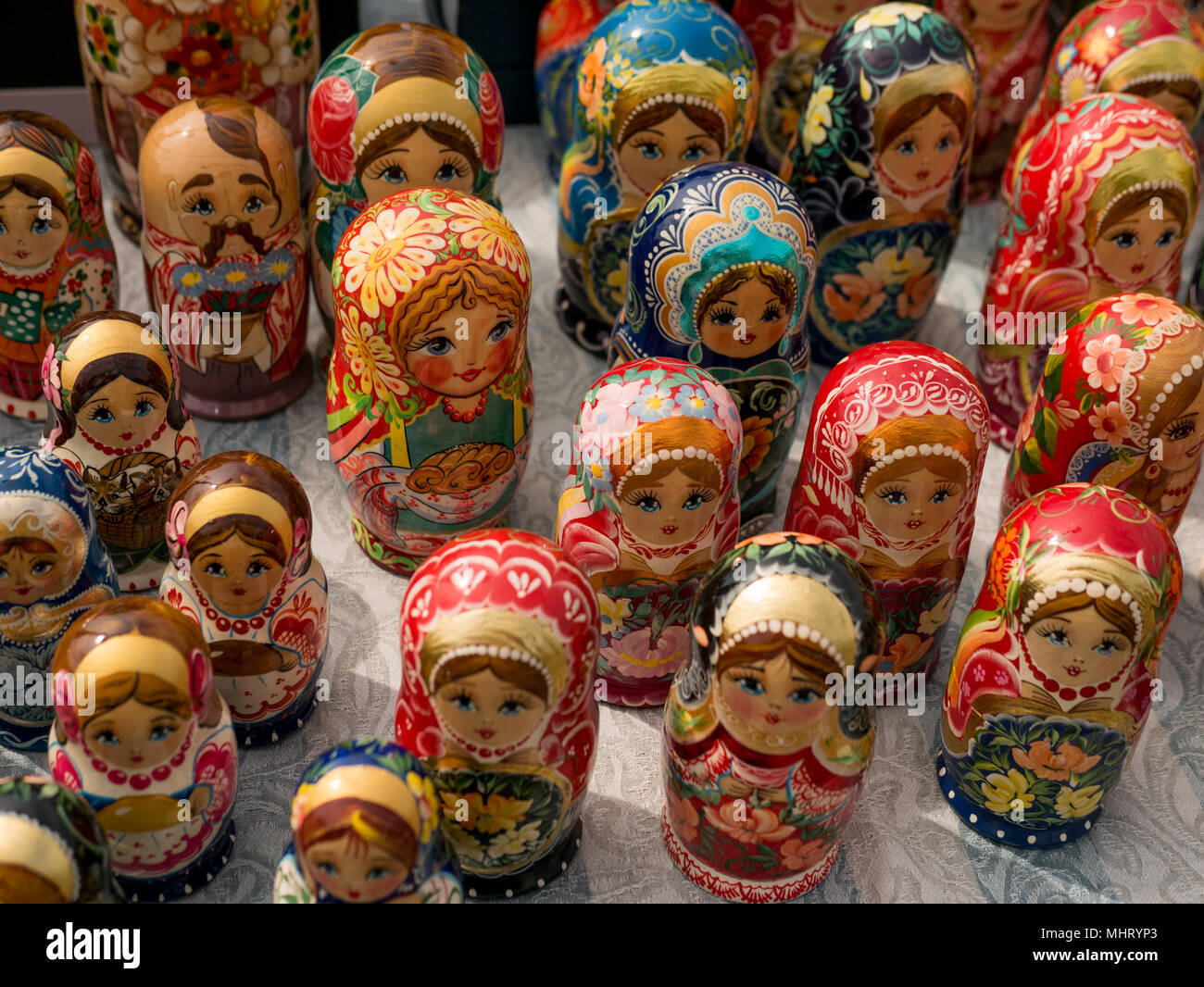 Matrioshka at the street market, iconic popular souvenir from Russia, Ukraine. Colorful bright russian nesting dolls. National traditions Consept Stock Photo
