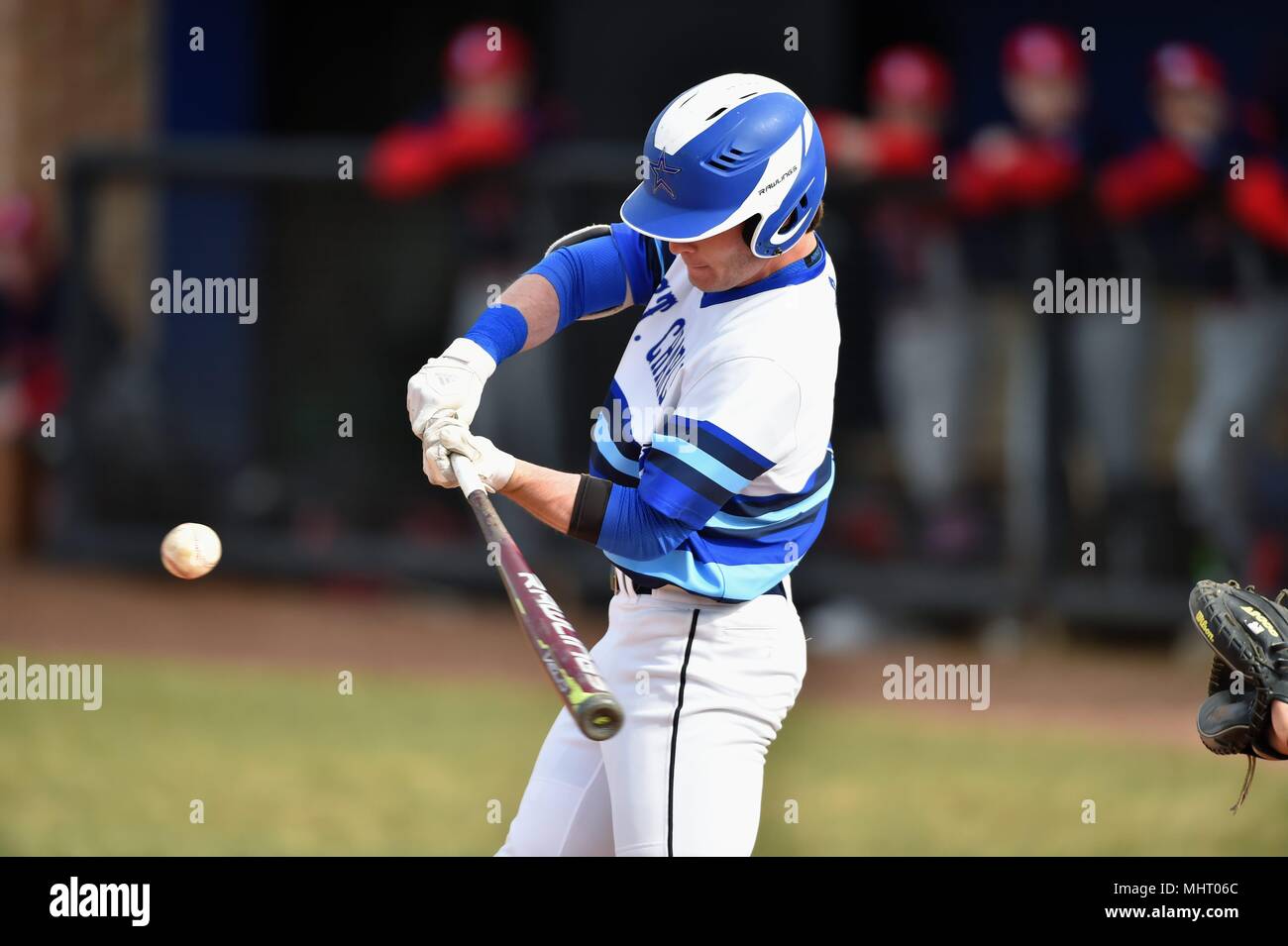 Batter swinging at a pitch during a high school baseball game. USA. Stock Photo