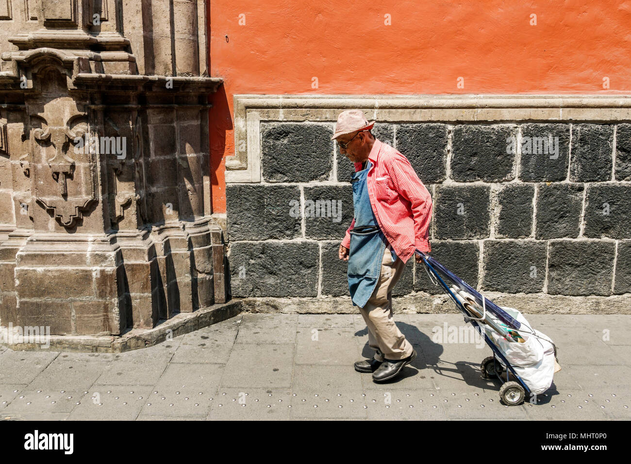 Mexico City,Mexican,Hispanic,Centro historico,historic Center Centre,Calle Moneda,pedestrian street,man men male,senior seniors citizen citizens,walki Stock Photo