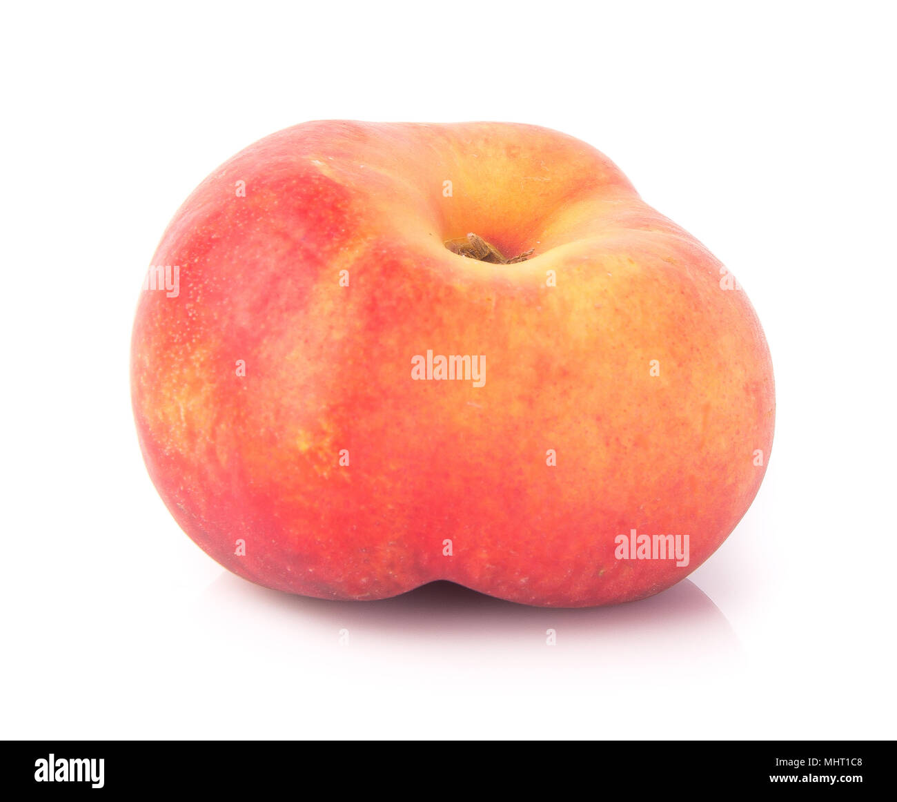 donut peaches. flat peaches on the background Stock Photo