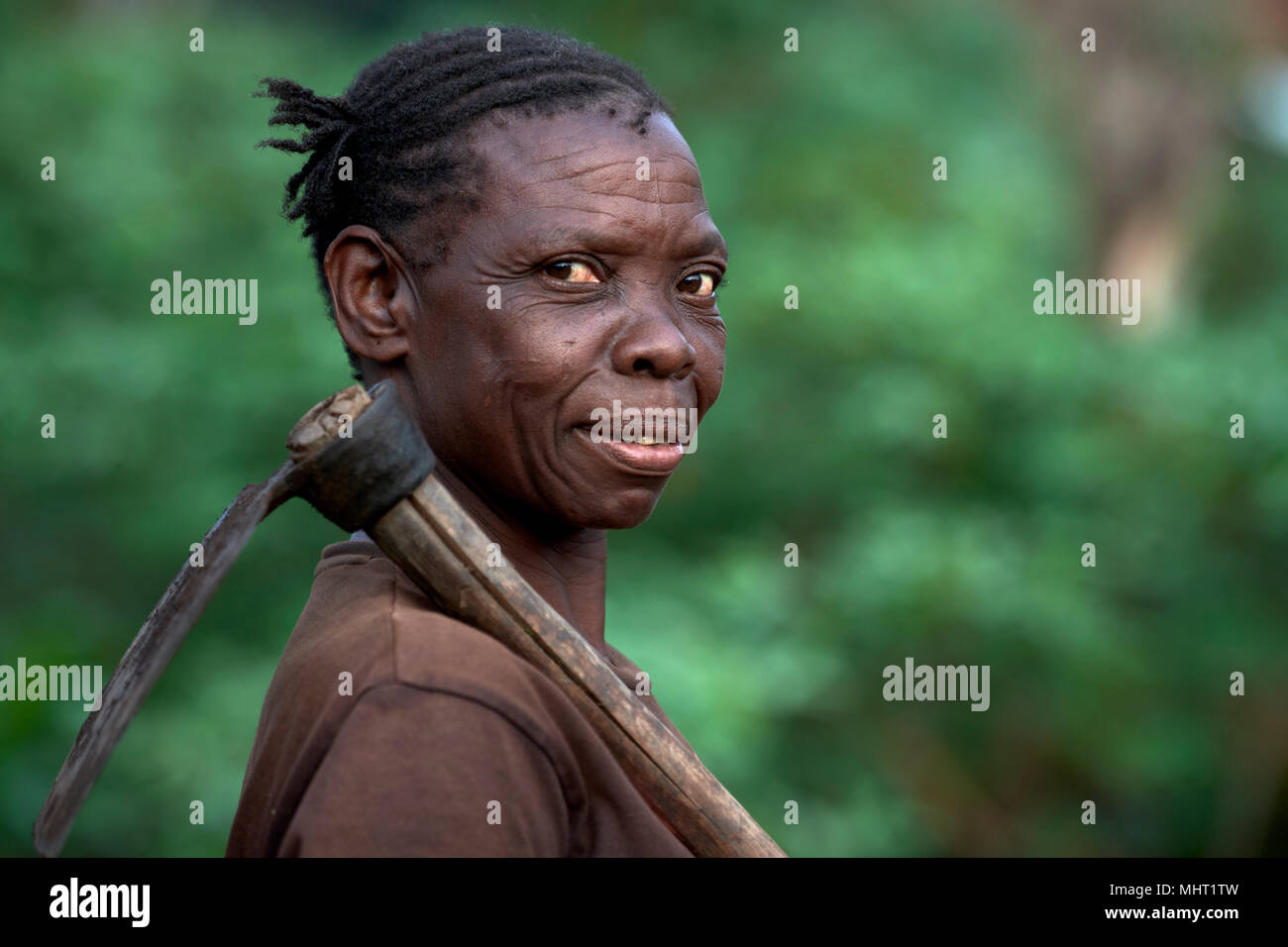 A woman displaced by armed conflict in a camp for internally displaced persons in Riimenze, South Sudan. Stock Photo
