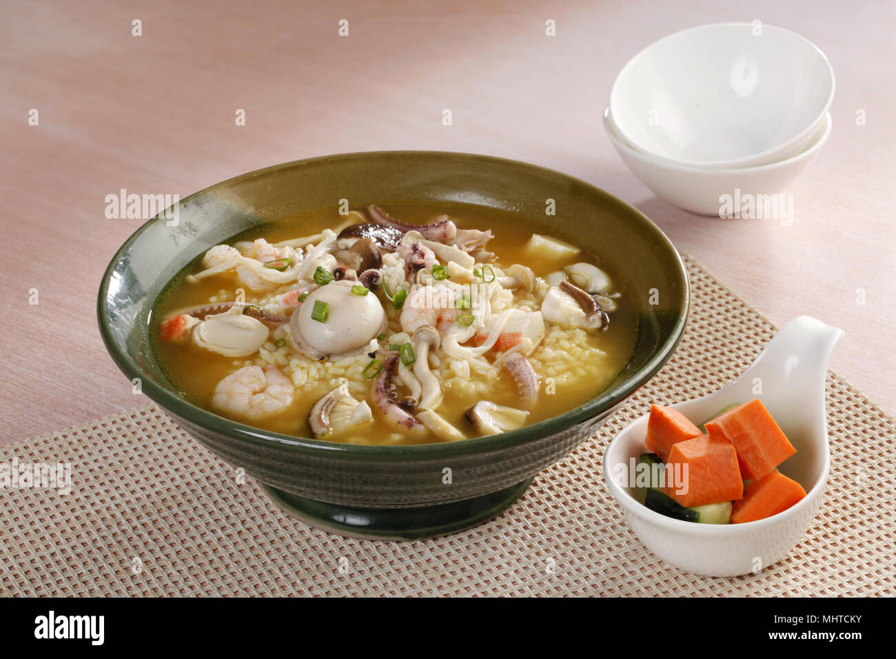 hot and sour seafood rice stew Stock Photo - Alamy