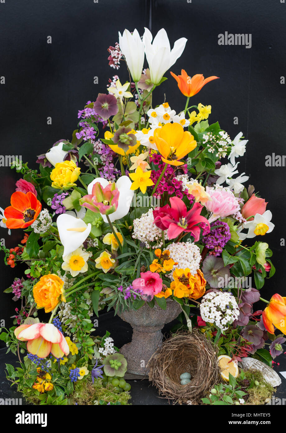Large flower arrangement against a black background Stock Photo