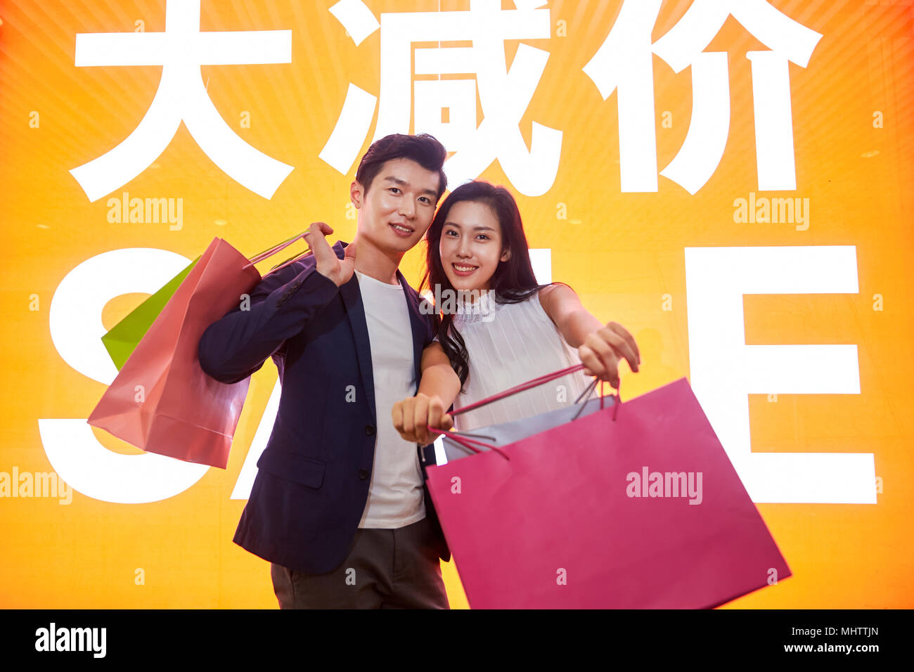 Young couples shopping Stock Photo Alamy