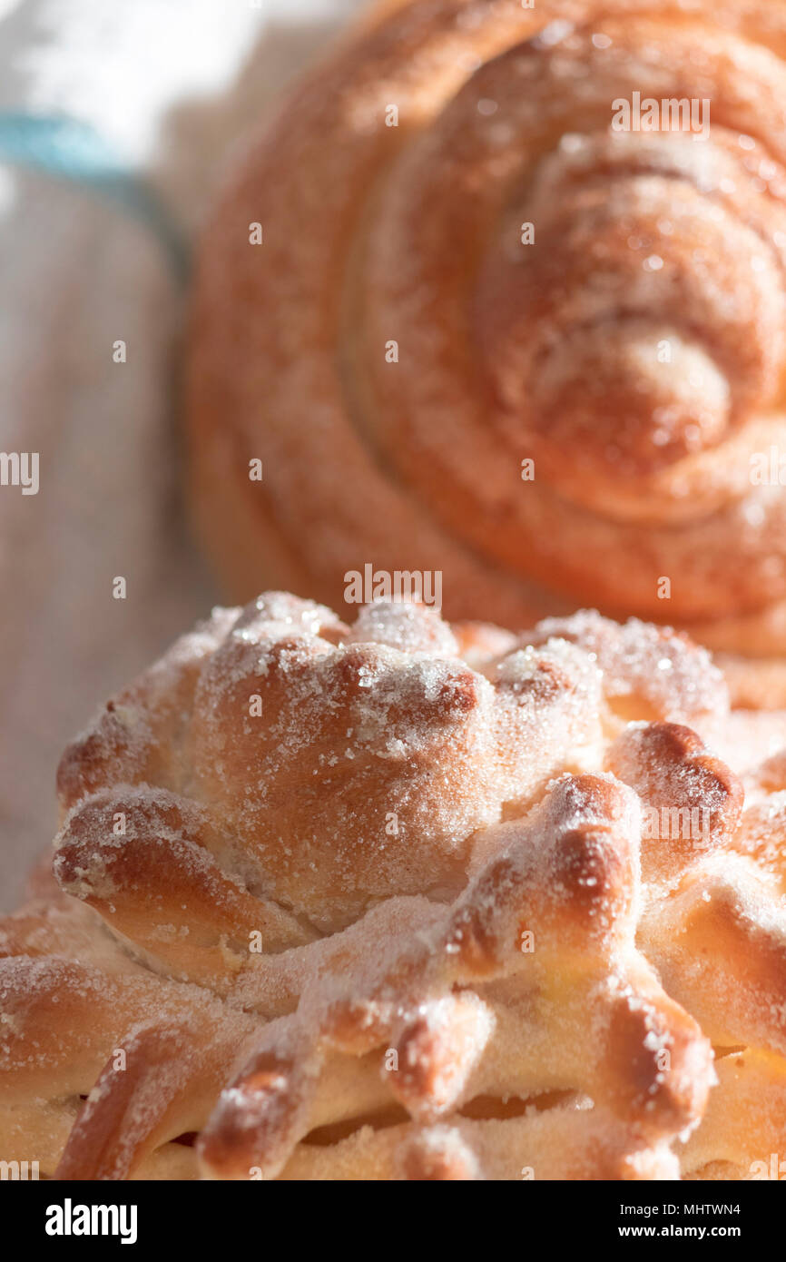 Closeup of sweet sugary bread typically prepared for day of the dead celebration, a Mexican Halloween when offerings are made to ancestors. Stock Photo