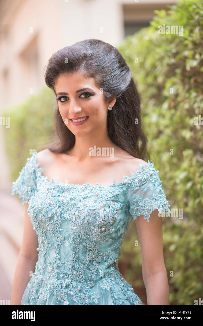 Portrait of a beautiful woman smiling outdoors Stock Photo - Alamy