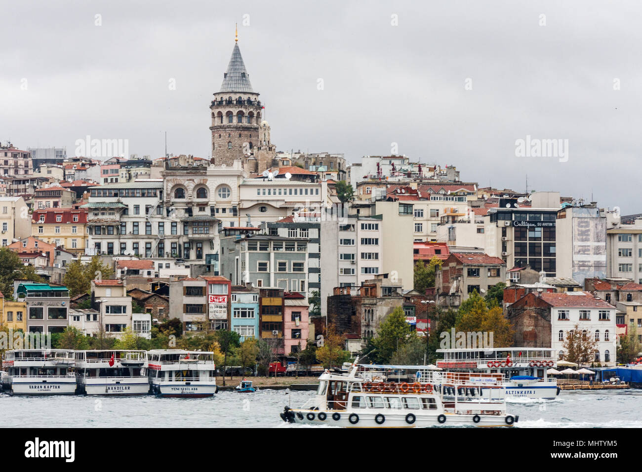 istanbul, Turkey-10th October 2011: The Beyoglu tower rises above other buildings with the Bosphorous below. Stock Photo