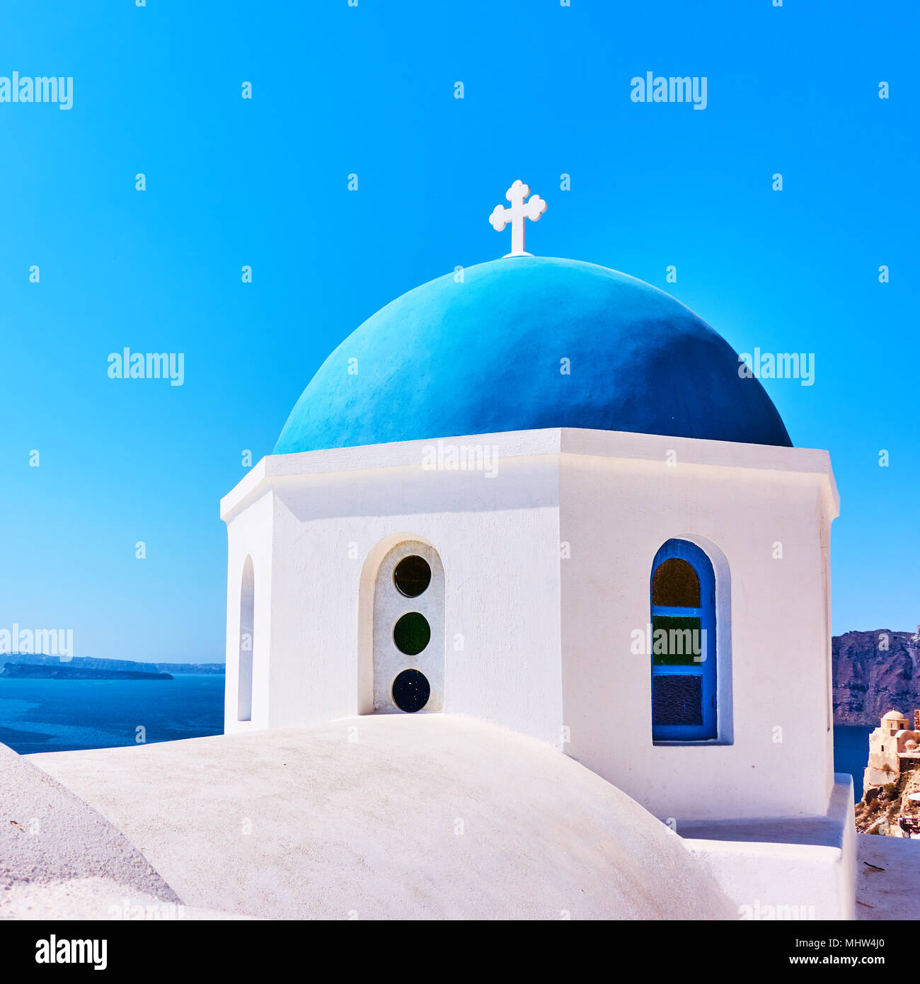 Blue dome of Greek orthodox church in Oia in Santorini island, Greece Stock Photo