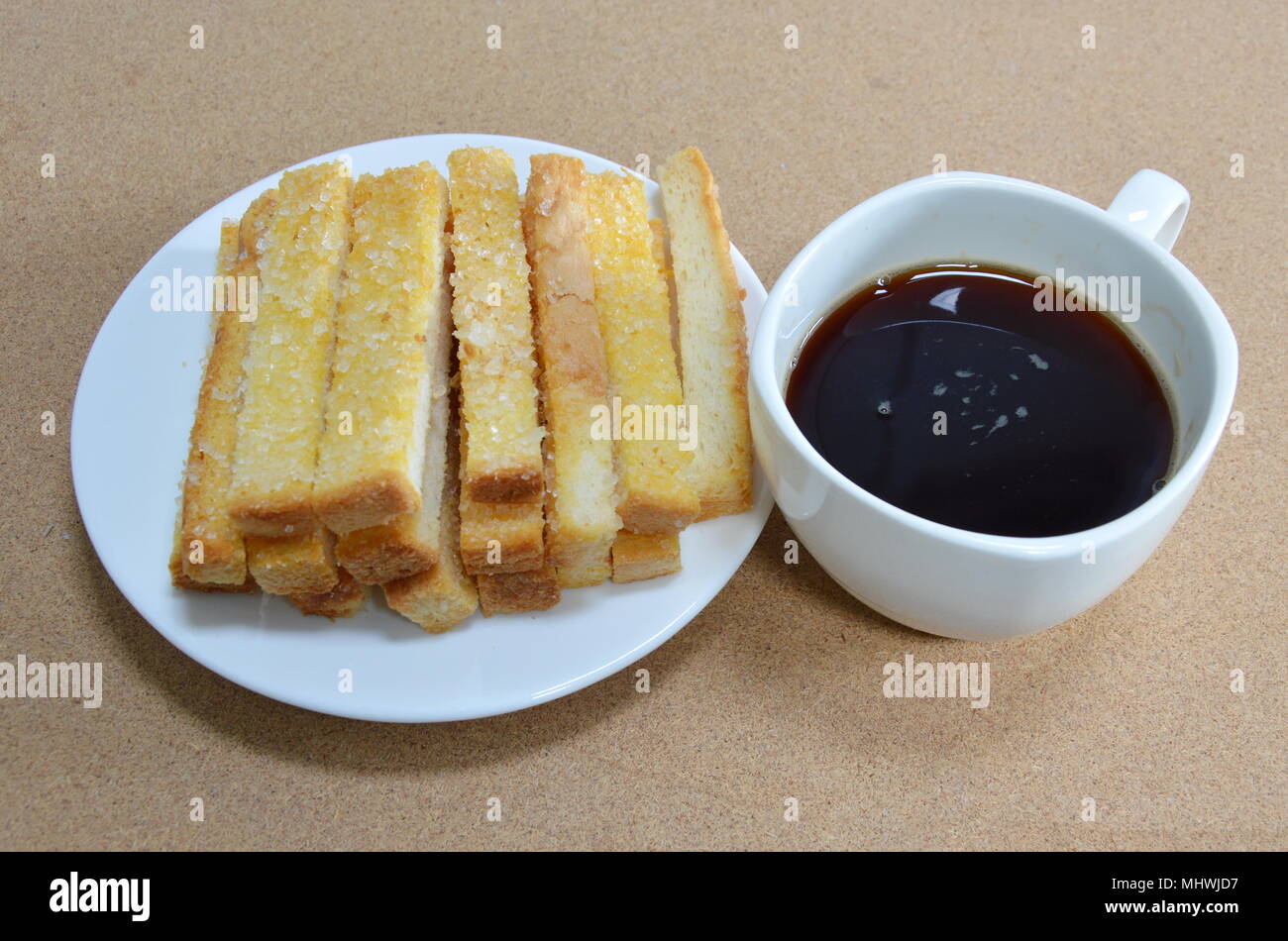 Butter Toasted Bread Topping Sugar On Dish And Black Coffee Cup Stock Photo Alamy Butter Toasted Bread Topping Sugar On Dish And Black Coffee Cup Stock Photo Alamy