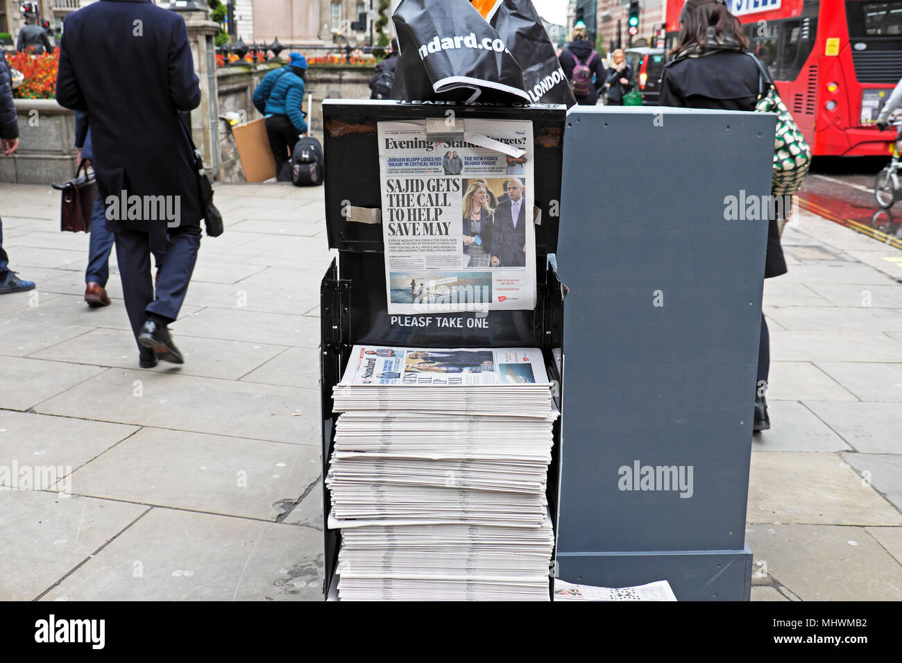 'Sajid Gets the Call to Help Save May' Sajid Javid new Tory Home Secretary Evening Standard stack of newspapers in London street UK on  30 April 2018 Stock Photo