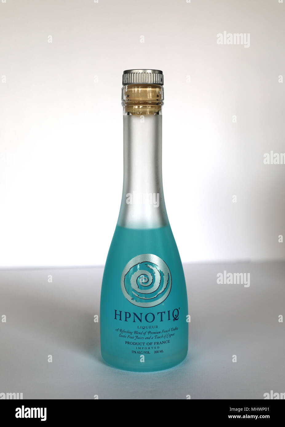 Hpnotiq Blue Liqueur Vodka Exotic Fruits and Cognac 17% Alcohol Bottle on  White Background Product Of France Stock Photo - Alamy