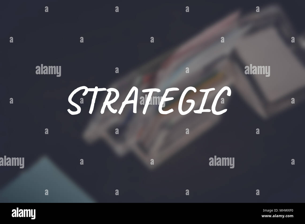 Strategic word with blurring business background Stock Photo - Alamy