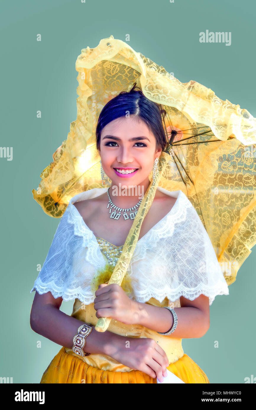A pretty Filipino girl dresses in old Spanish lace style costume at the Cultural Dance and Costume Parade in Puerto Princesa, Palawan, Philippines. Stock Photo